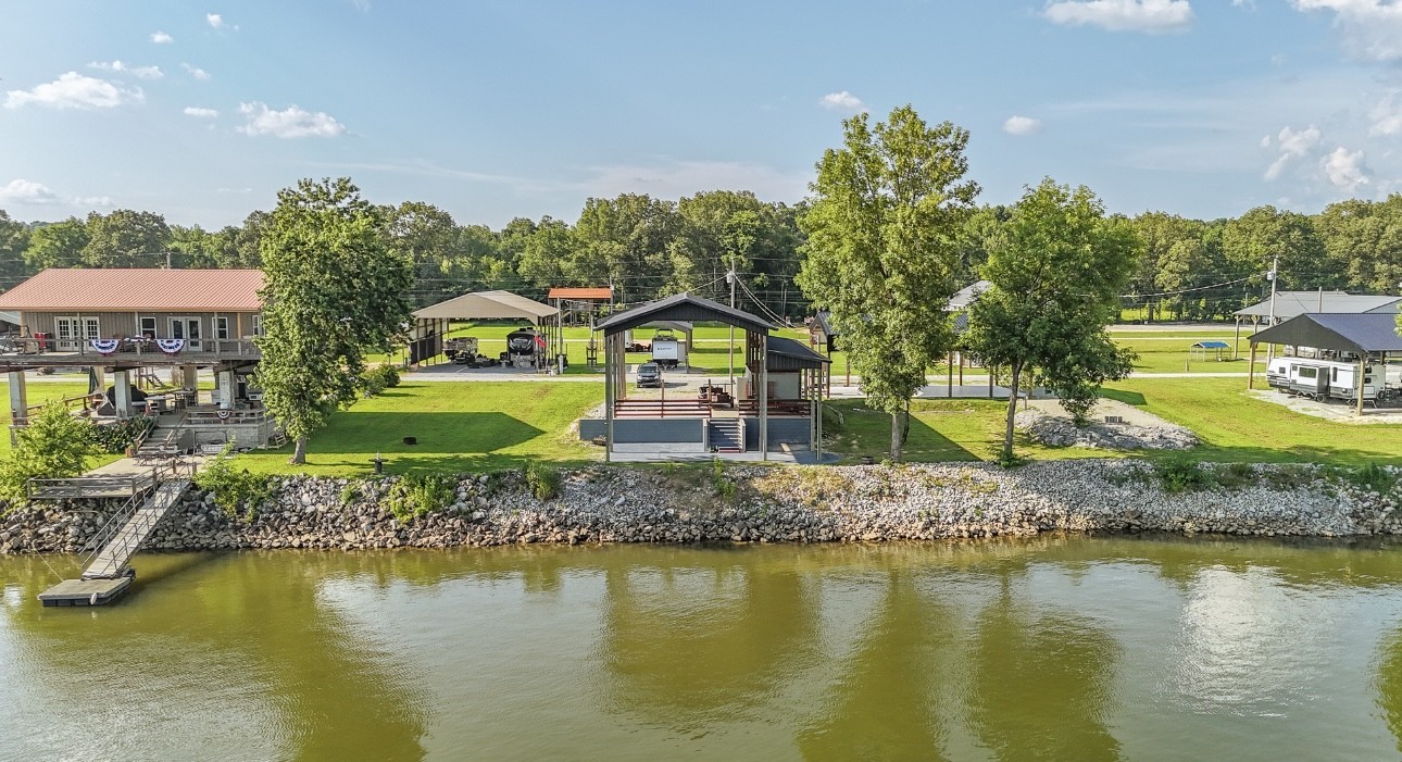 1085 WC PICKETT Road Clifton, TN 38425 - Photo 7 of 72 a view of a house with pool yard and outdoor seating