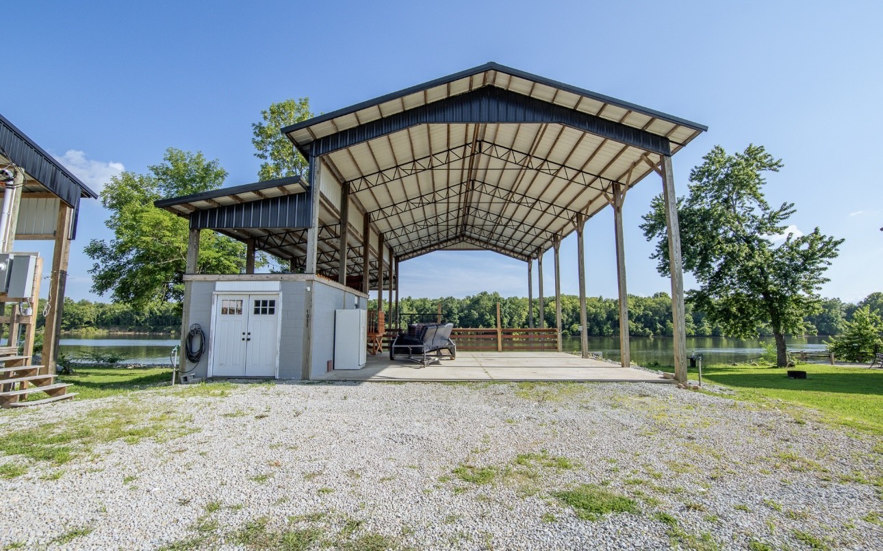 1085 WC PICKETT Road Clifton, TN 38425 - Photo 72 of 72 a front view of a house with a garden