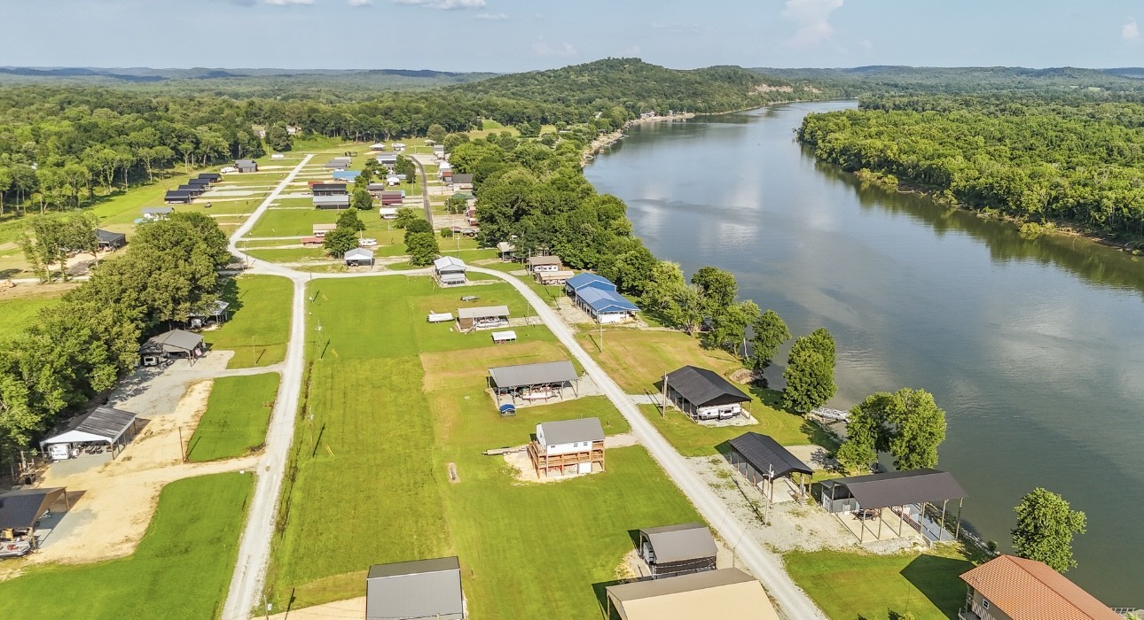 1085 WC PICKETT Road Clifton, TN 38425 - Photo 8 of 72 an aerial view of residential houses with lake view