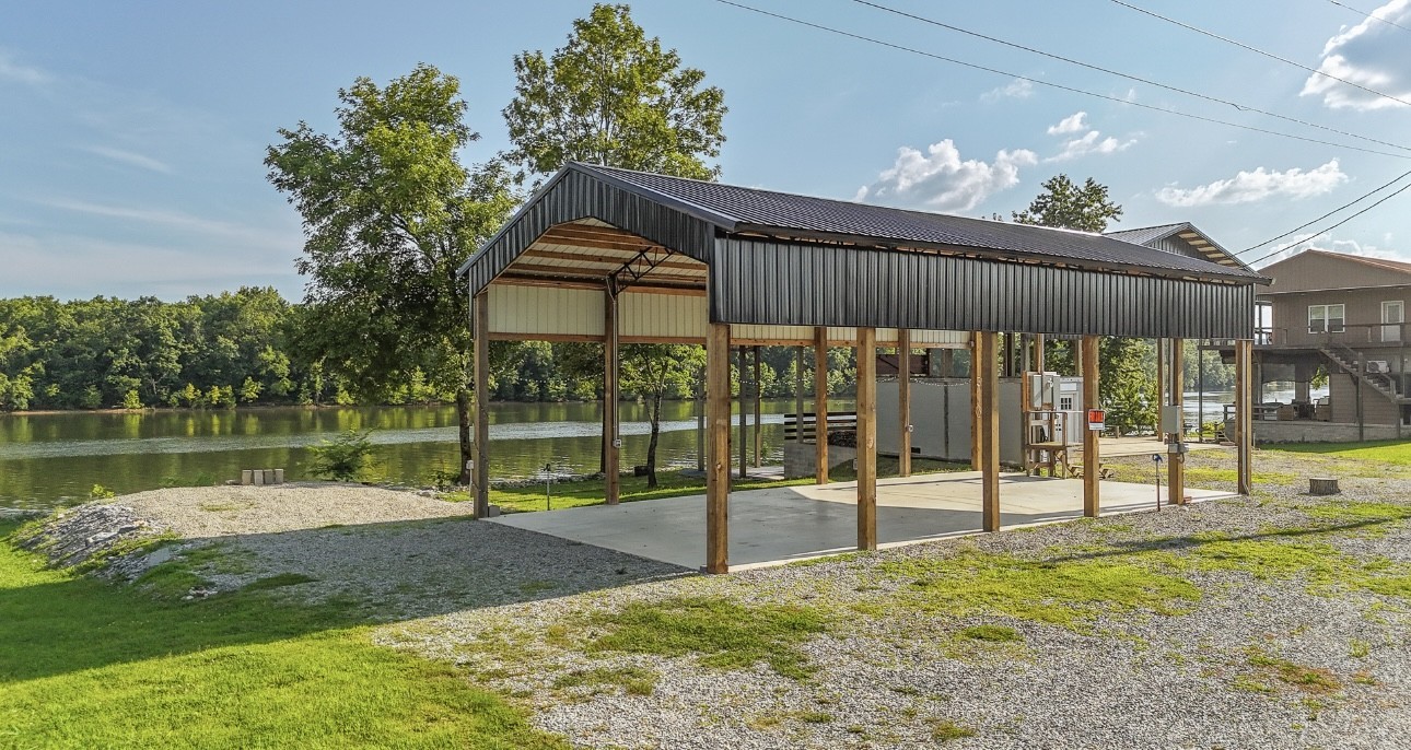 1085 WC PICKETT Road Clifton, TN 38425 - Photo 10 of 72 a view of a house with backyard and sitting area