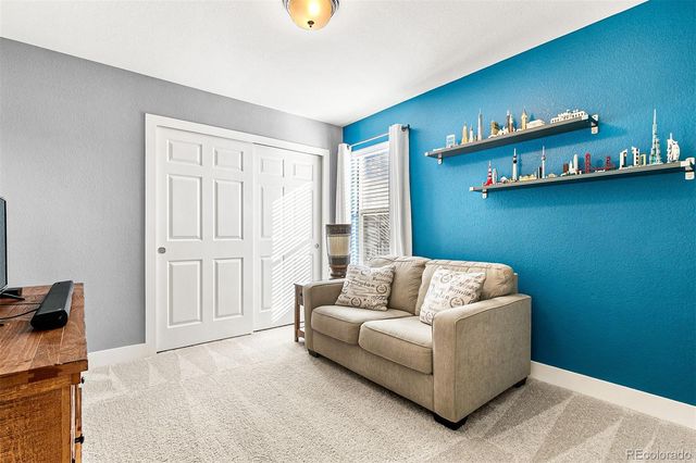 a living room with furniture and a couch