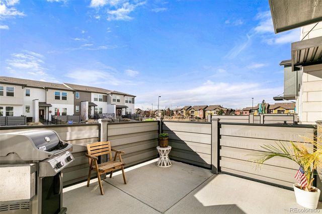 a view of a terrace with furniture