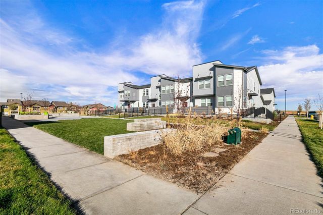 a view of a city with tall buildings