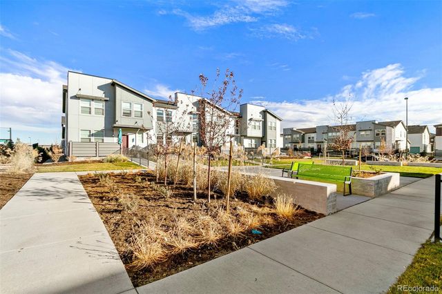 a view of a swimming pool with a lounge chairs