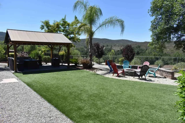 a backyard of a house with lots of green space