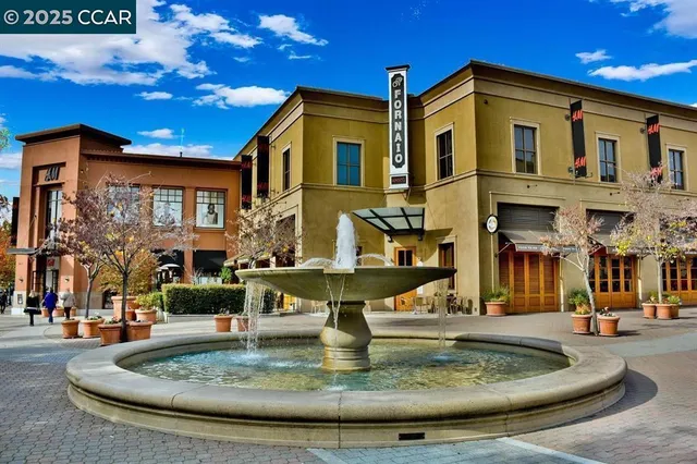 a view of a building with a fountain