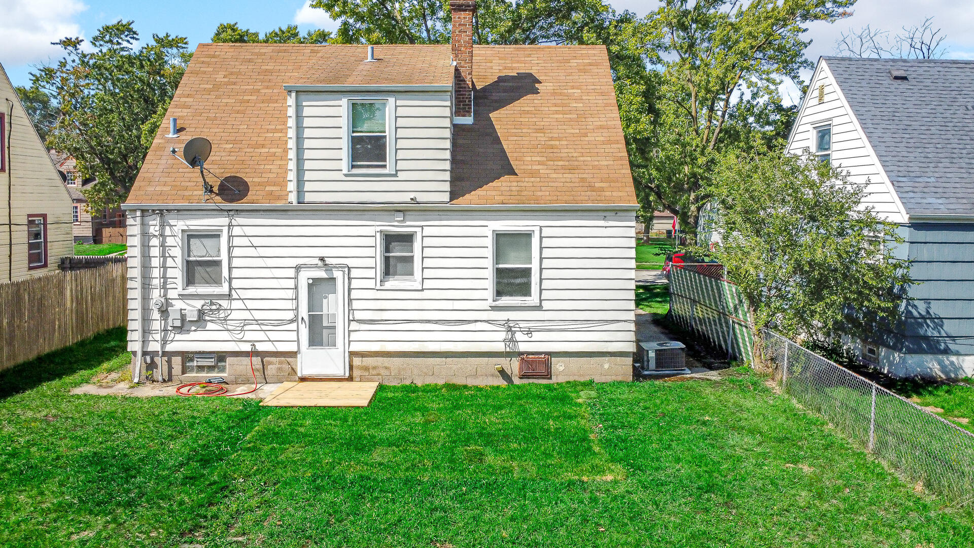 6723 Baring Avenue Hammond, IN 46324 - Photo 22 of 23 a front view of a house with a yard