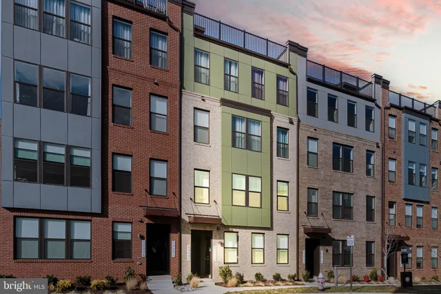 a front view of a building with a street