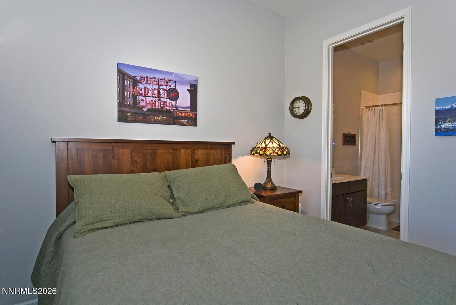 2332 Hammer Falls Drive Reno, NV 89521 - Photo 31 of 57 a bedroom with a bed and dresser