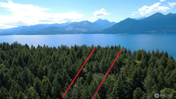 a view of a lake with a mountain in the background