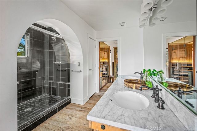 a bed room with a bed and a window