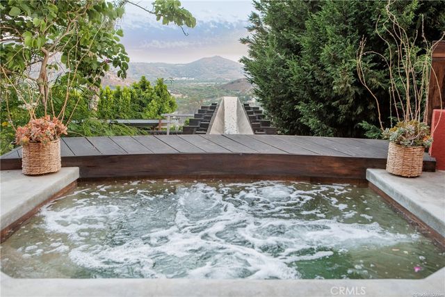 a view of a balcony with outdoor space