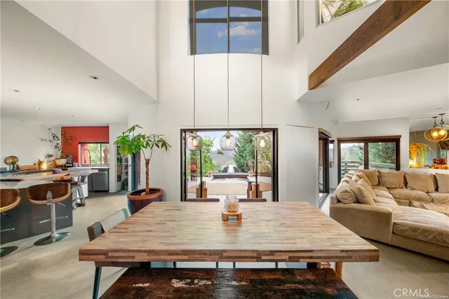 a bathroom with a tub sink and window