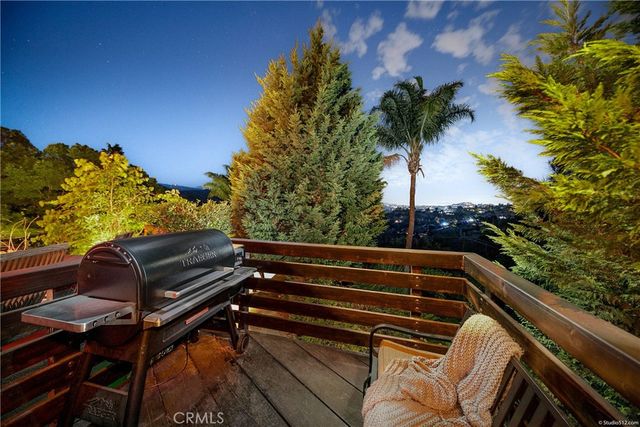 a kitchen with a refrigerator and a sink