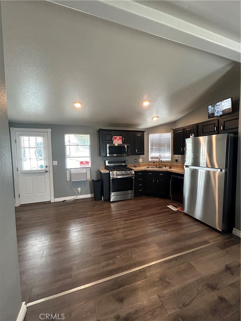 6050 Mission Boulevard, Unit 2 Riverside, CA 92509 - Photo 1 of 1 a view of kitchen with cabinets and stainless steel appliances