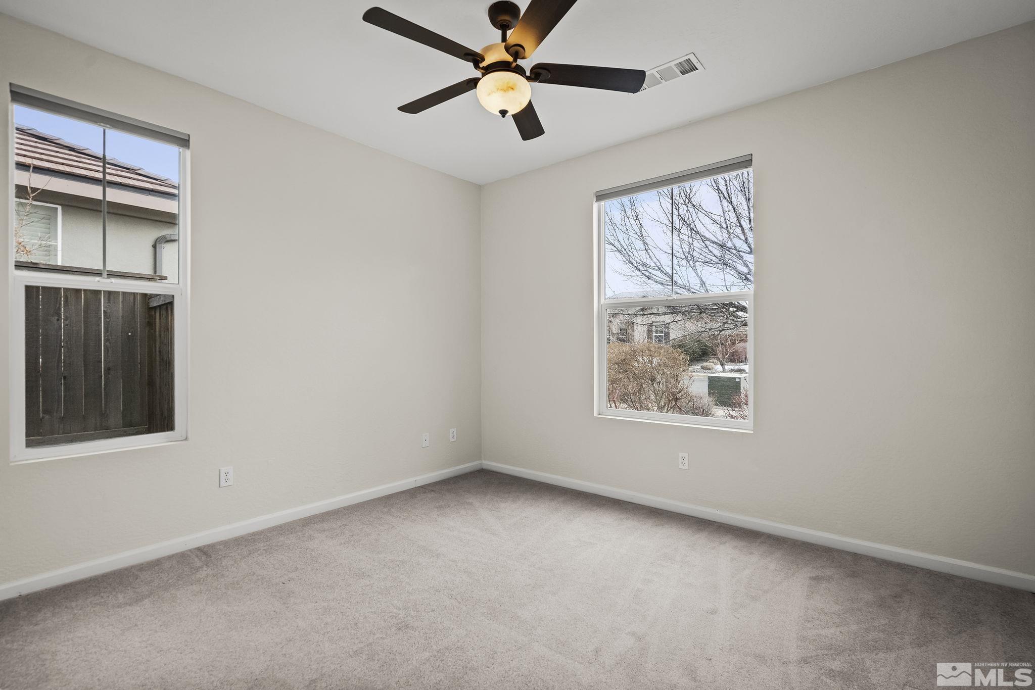 9185 Heritage Ridge Court Reno, NV 89523 - Photo 14 of 31 a view of an empty room with a window
