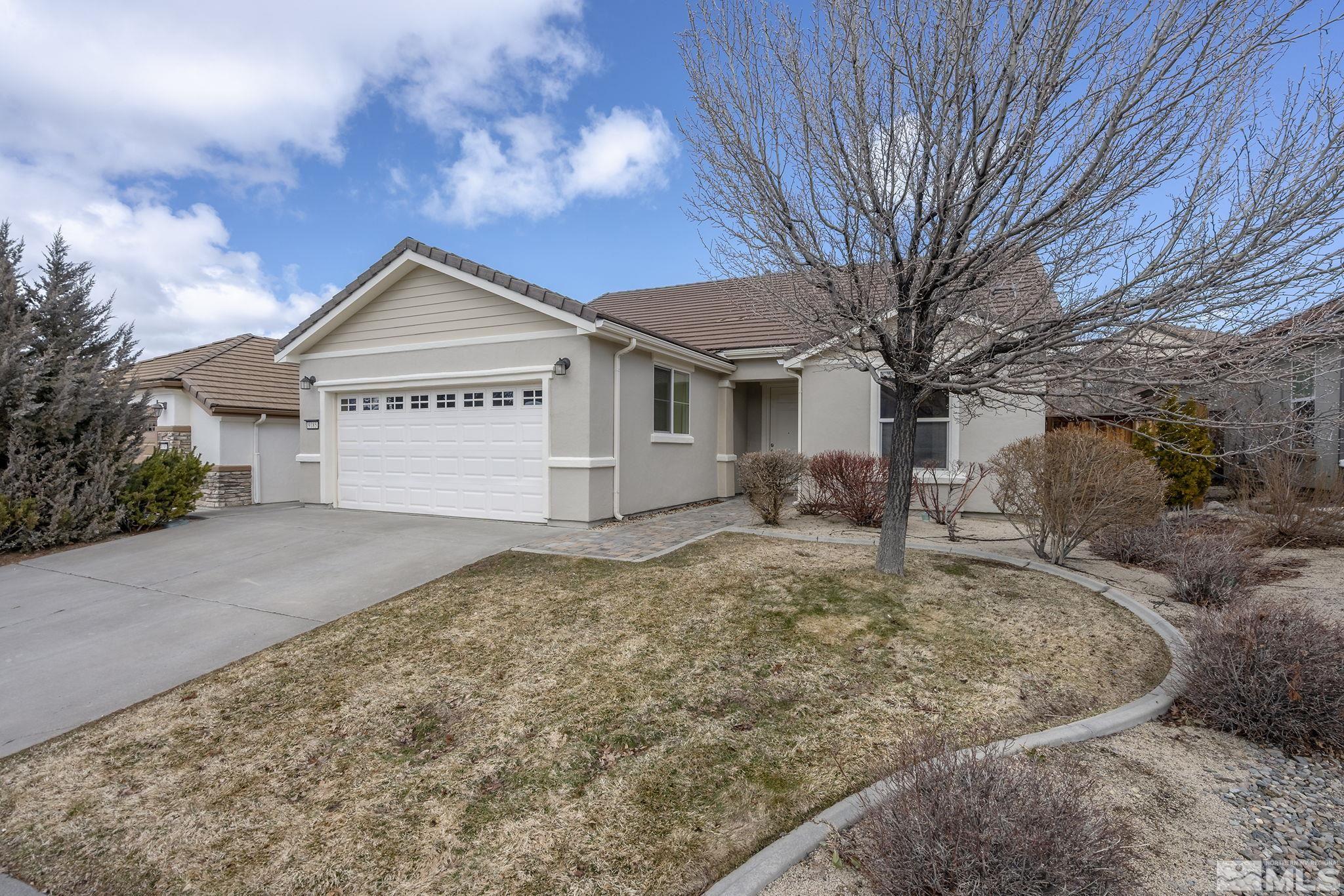 9185 Heritage Ridge Court Reno, NV 89523 - Photo 2 of 31 a view of a house with a yard