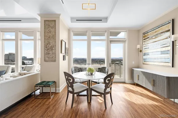 a dining room with furniture window wooden floor
