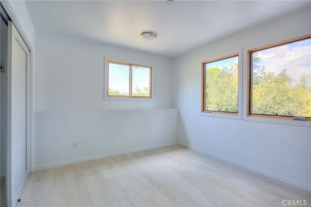 an empty room with windows