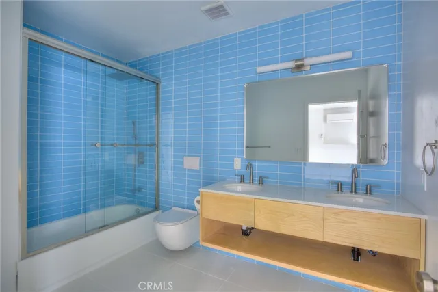 a bathroom with a sink and a bathtub