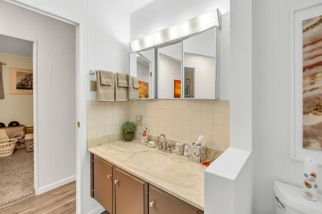 a view of storage and utility room with washer and dryer