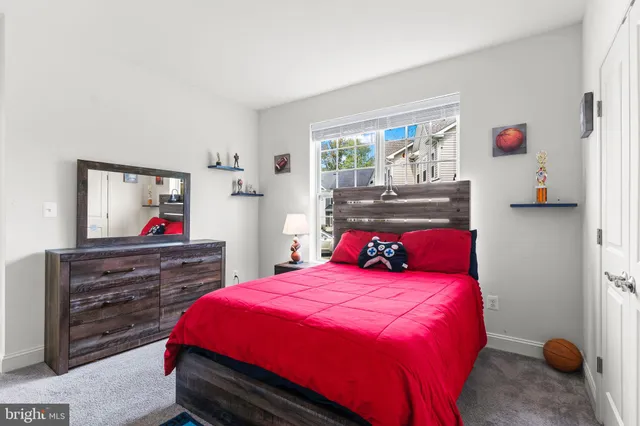 a bathroom with a sink vanity and mirror