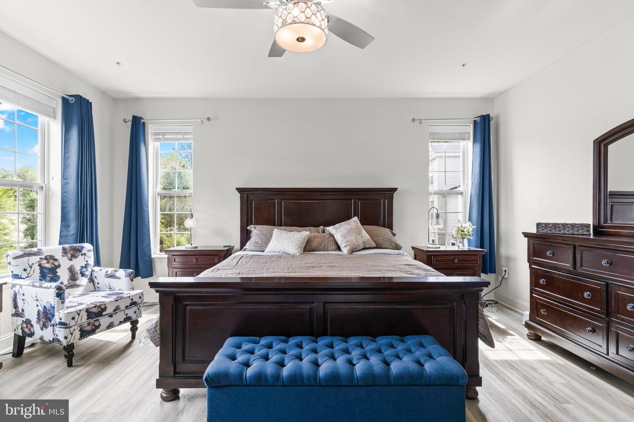 9104 Rama Court Clinton, MD 20735 - Photo 19 of 62 Serene bedroom with elegant wood accents.