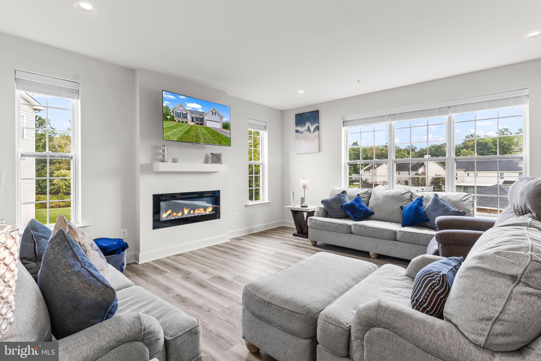 9104 Rama Court Clinton, MD 20735 - Photo 26 of 62 Bright and airy living space with modern flair.