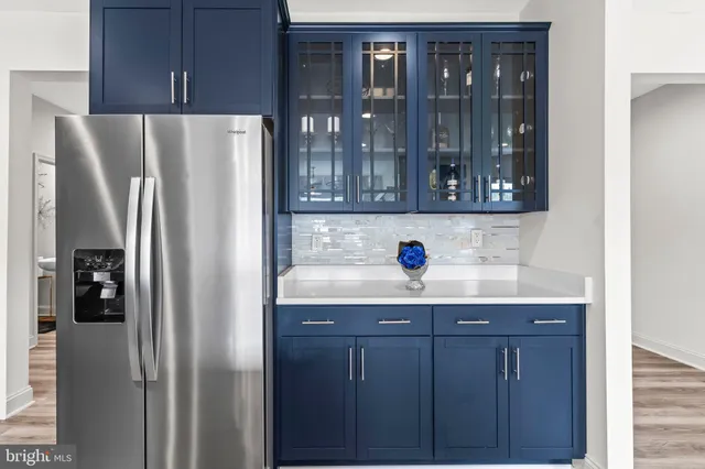 a spacious bedroom with a bed and a table