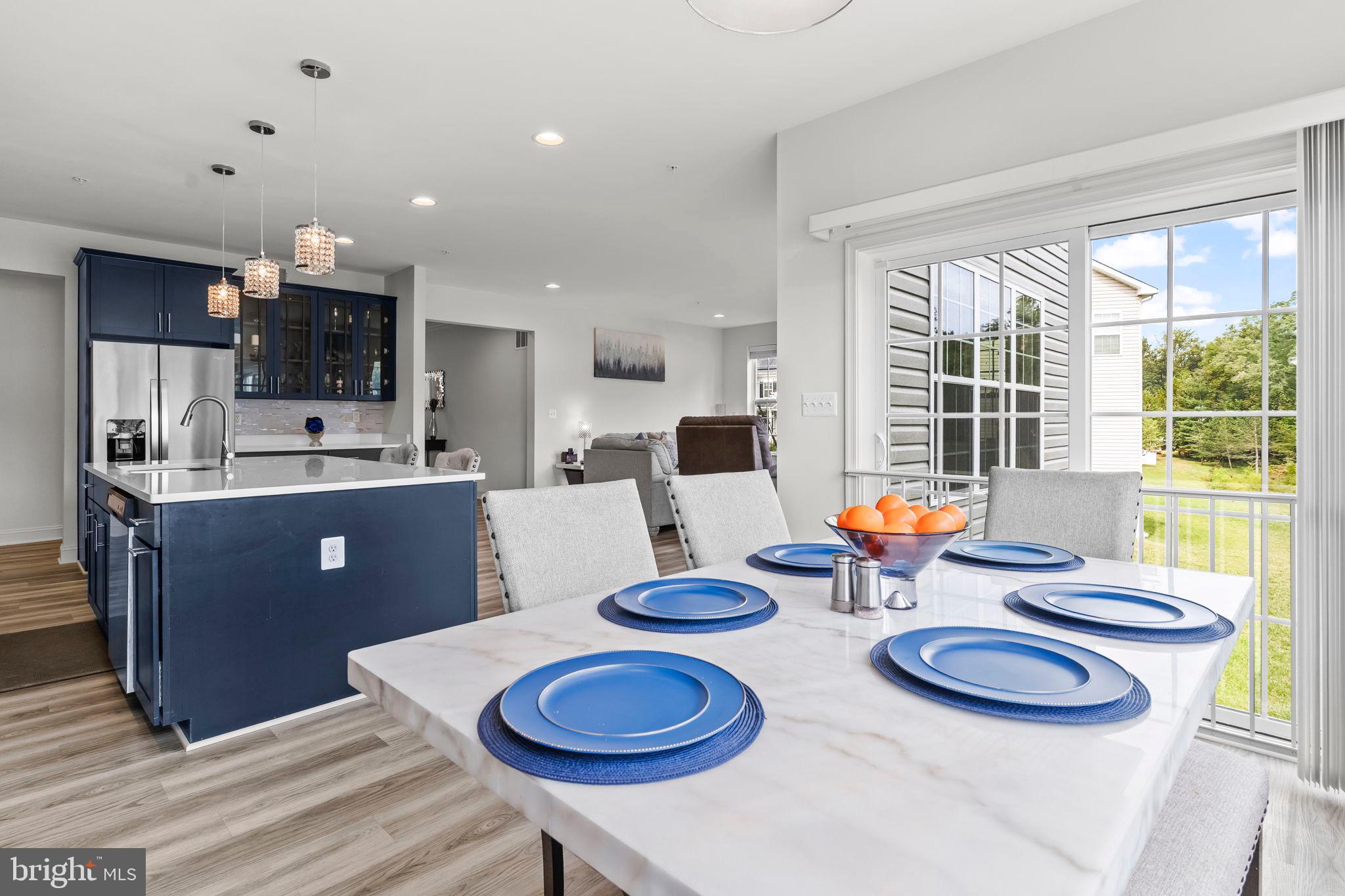 9104 Rama Court Clinton, MD 20735 - Photo 42 of 62 Modern dining space with vibrant accents.