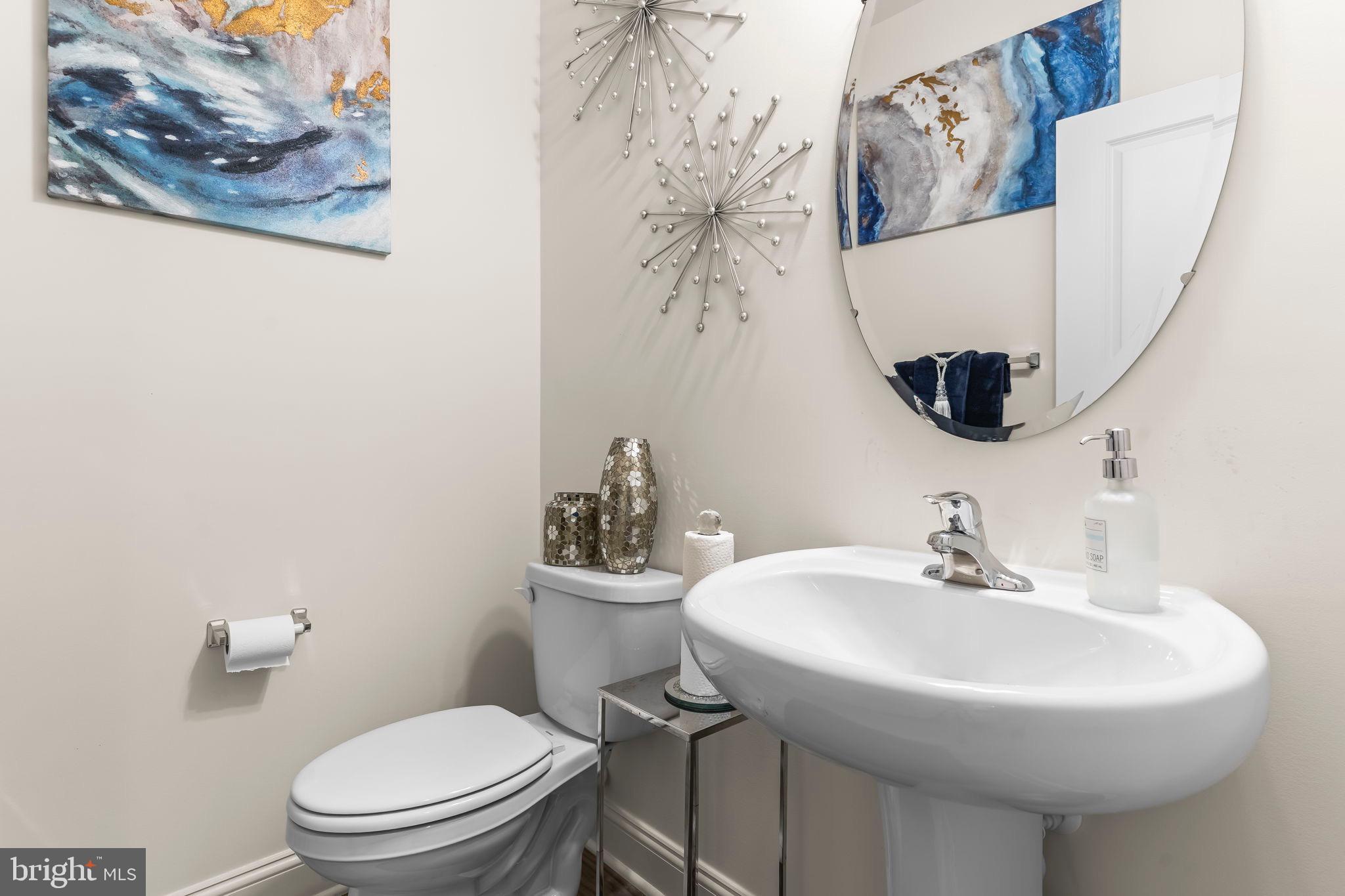 9104 Rama Court Clinton, MD 20735 - Photo 44 of 62 Chic powder room with modern accents.