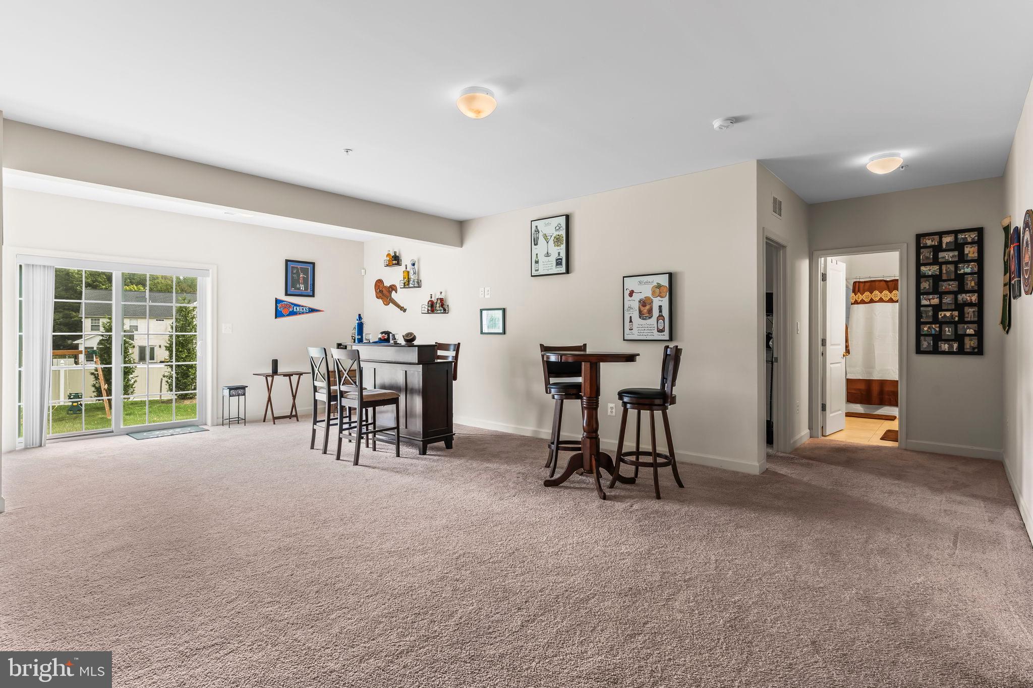 9104 Rama Court Clinton, MD 20735 - Photo 50 of 62 Spacious, inviting living area with natural light.