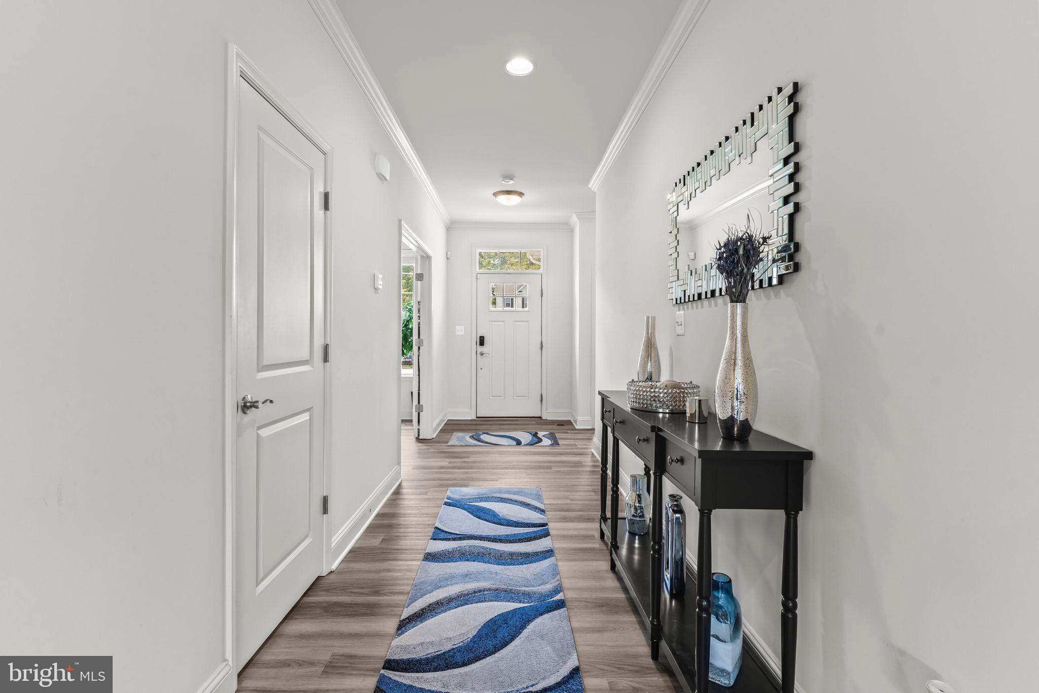 9104 Rama Court Clinton, MD 20735 - Photo 5 of 62 Inviting hallway with modern accents.