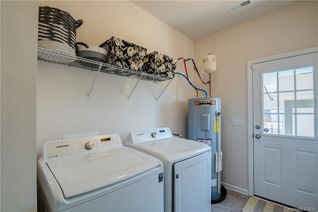 1014 Bannister Road Waxhaw, NC 28173 - Photo 21 of 48 a utility room with dryer and washer