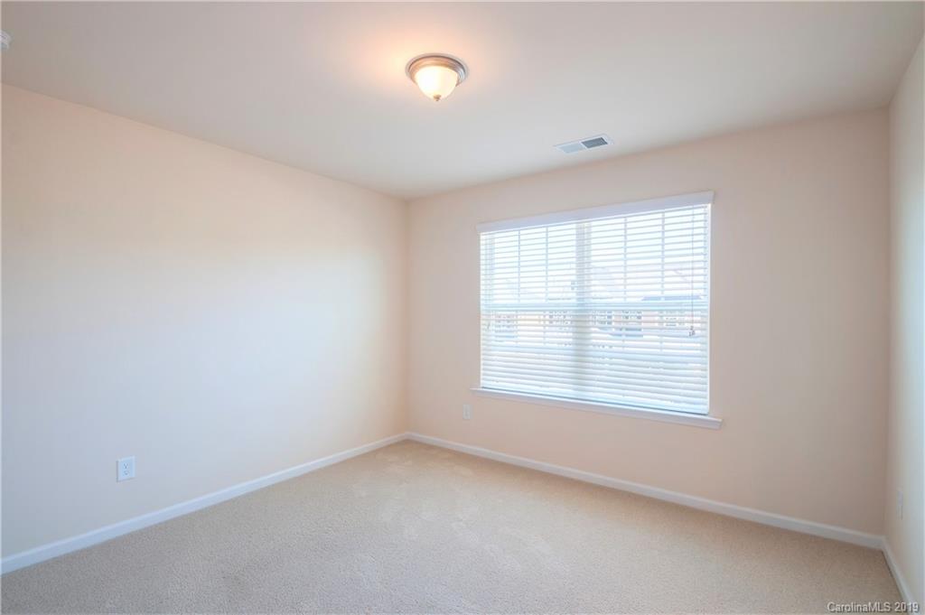 1014 Bannister Road Waxhaw, NC 28173 - Photo 30 of 48 an empty room with a window
