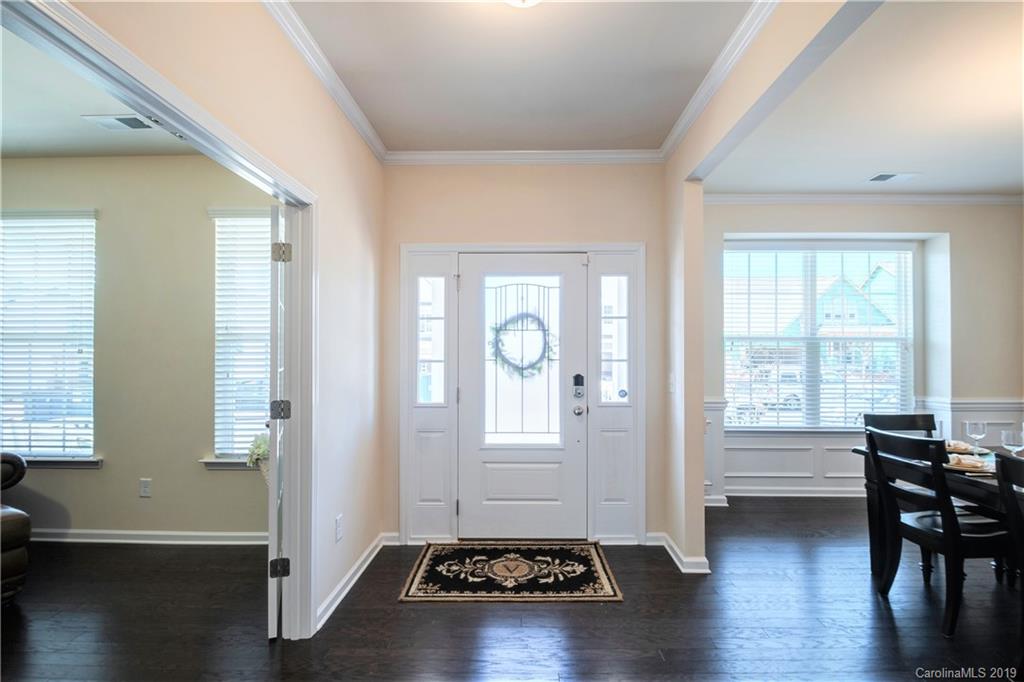 1014 Bannister Road Waxhaw, NC 28173 - Photo 4 of 48 a view of a livingroom with furniture wooden floor and windows