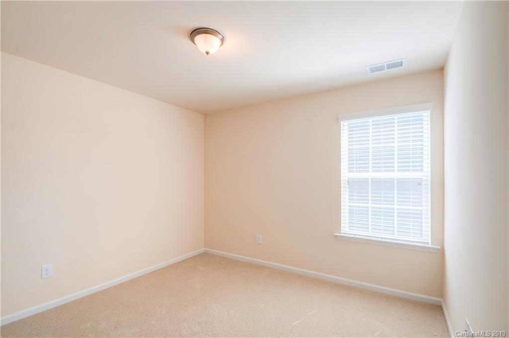 1014 Bannister Road Waxhaw, NC 28173 - Photo 34 of 48 an empty room with a window