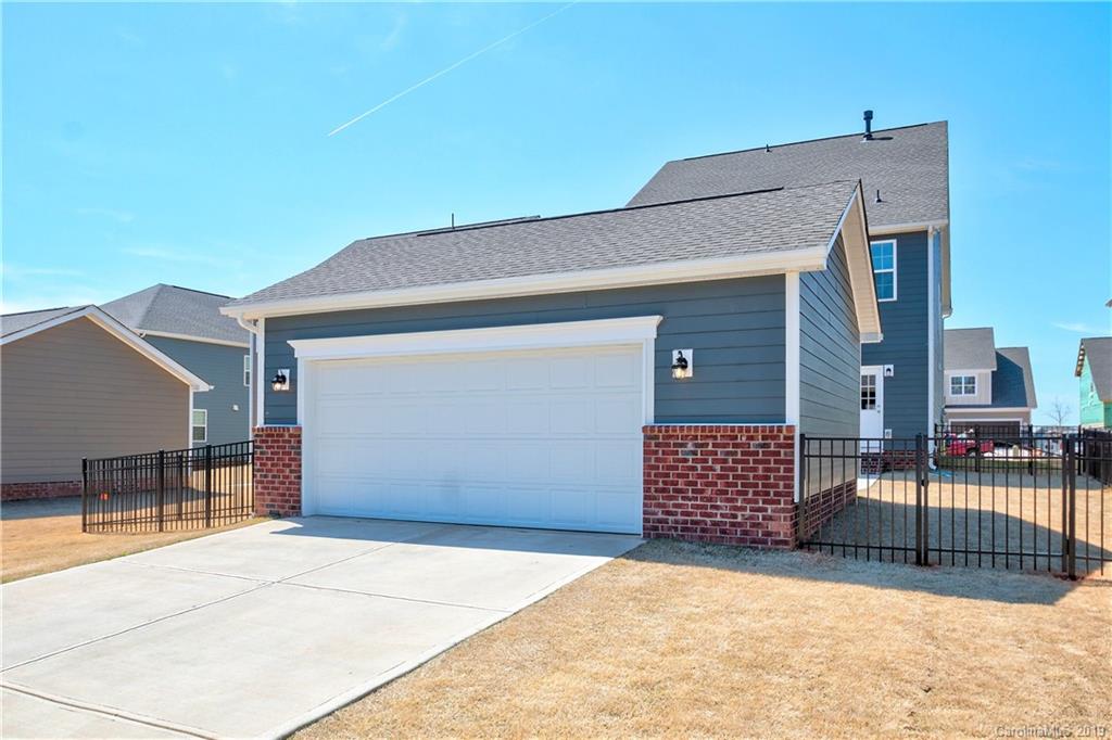 1014 Bannister Road Waxhaw, NC 28173 - Photo 38 of 48 a front view of a house with parking