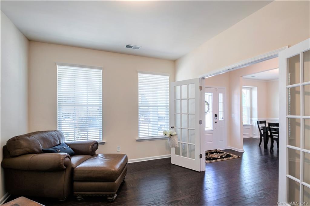 1014 Bannister Road Waxhaw, NC 28173 - Photo 5 of 48 a living room with furniture and wooden floor