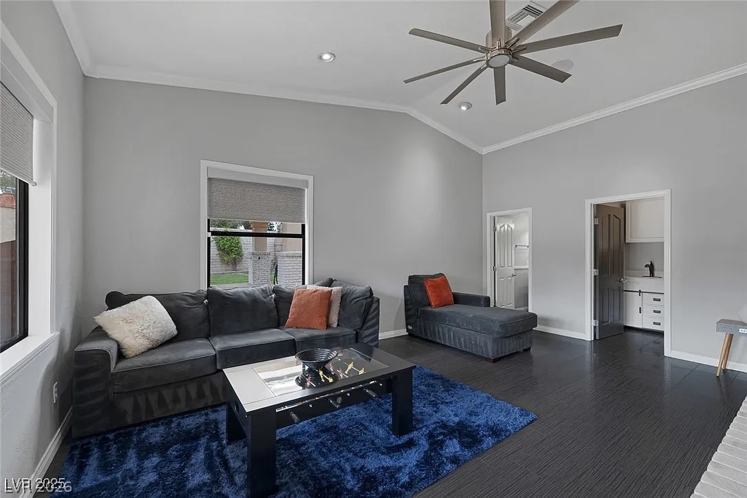 9 Quail Run Road Henderson, NV 89014 - Photo 33 of 57 Voluminous ceilings and dark hardwood floors define this inviting gathering space.