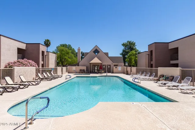 a view of a house with swimming pool