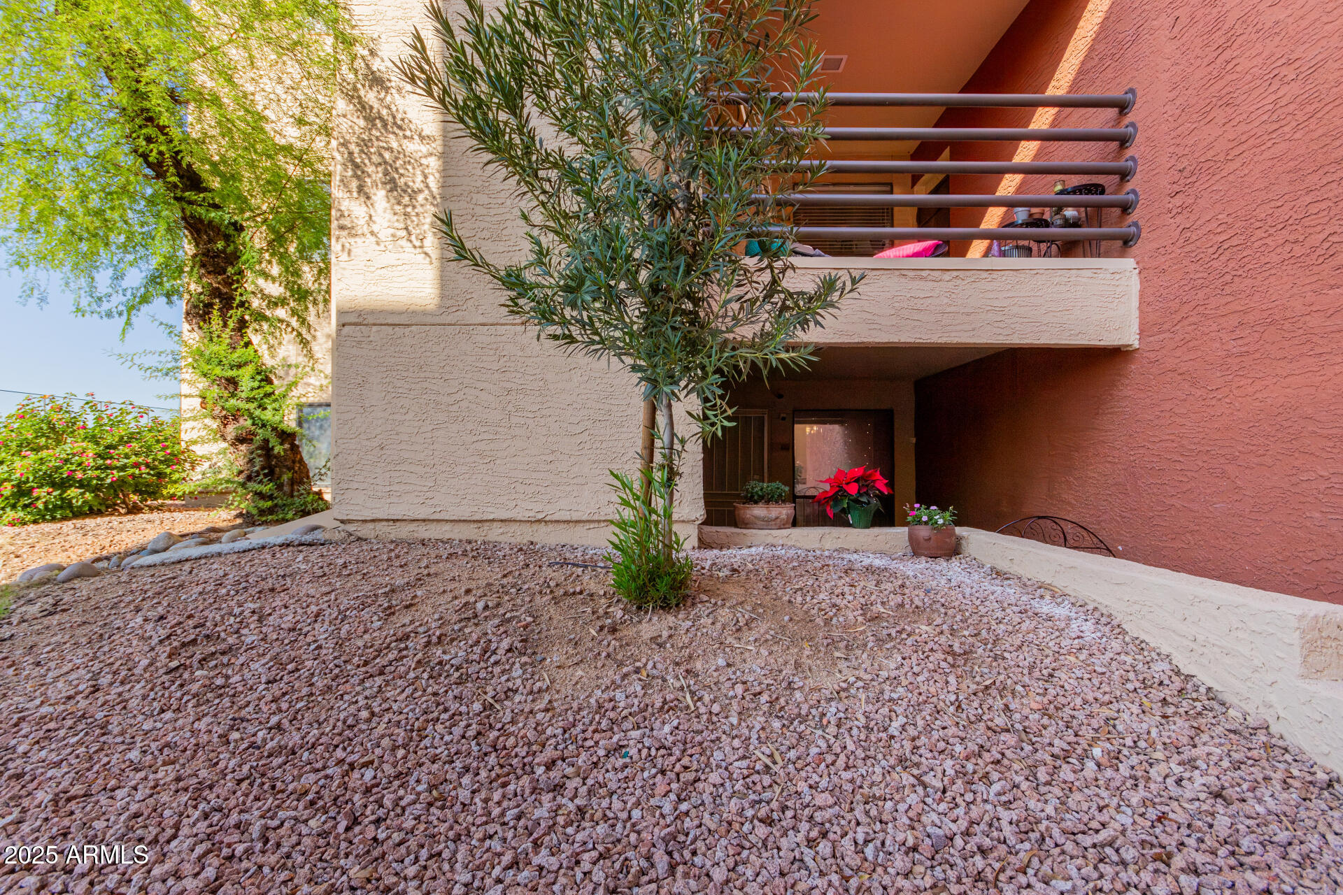 1340 North Recker Road, Unit 133 Mesa, AZ 85205 - Photo 2 of 17 a view of a room with a tree