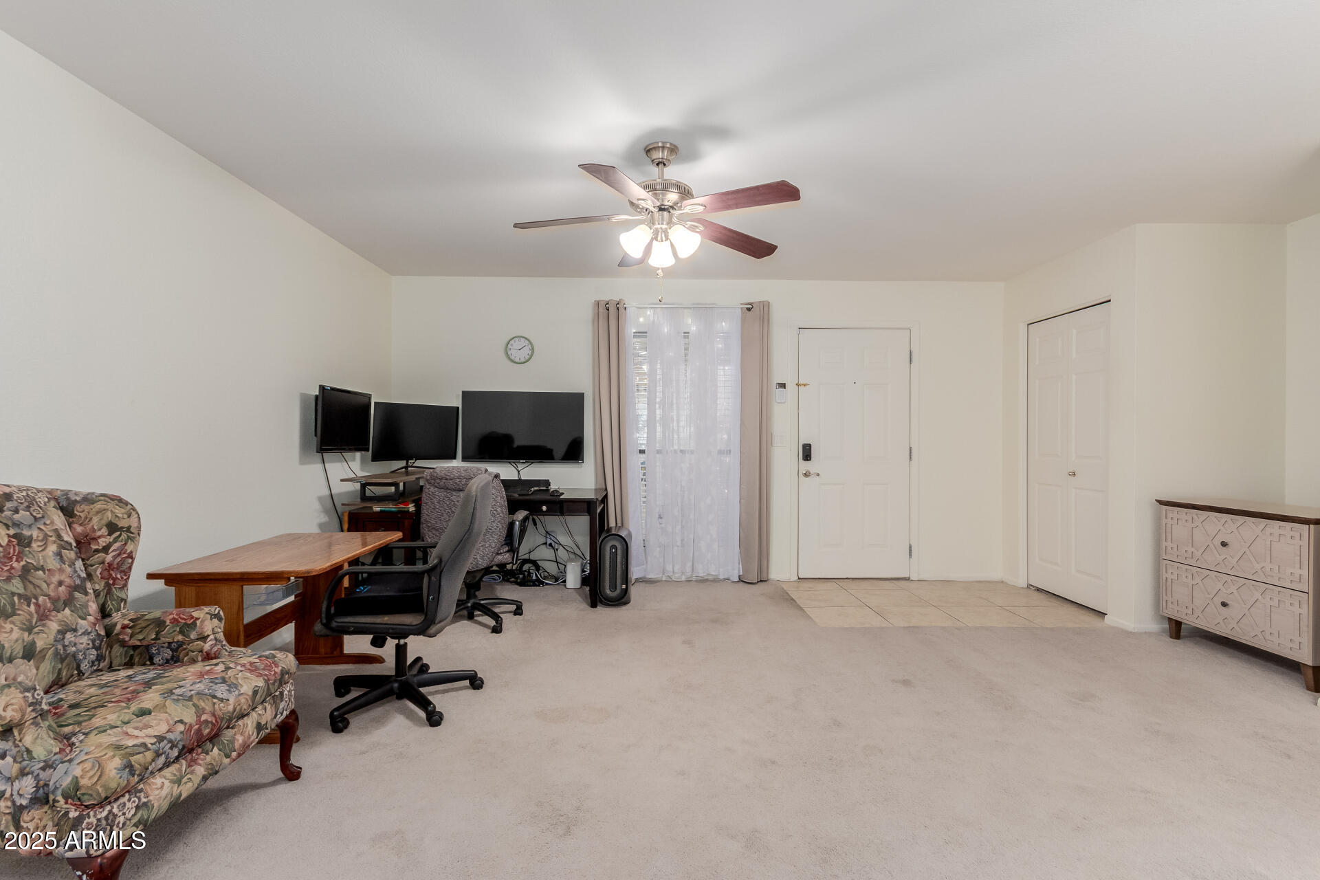 1340 North Recker Road, Unit 133 Mesa, AZ 85205 - Photo 5 of 17 a view of livingroom with workspace and a window