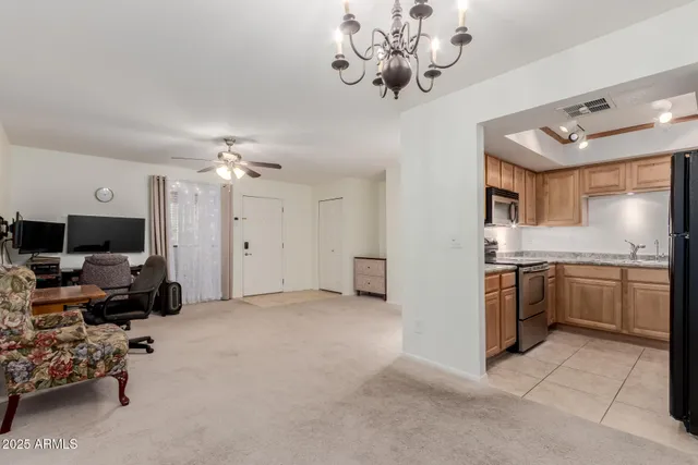 a view of a kitchen with a sink cabinets and window