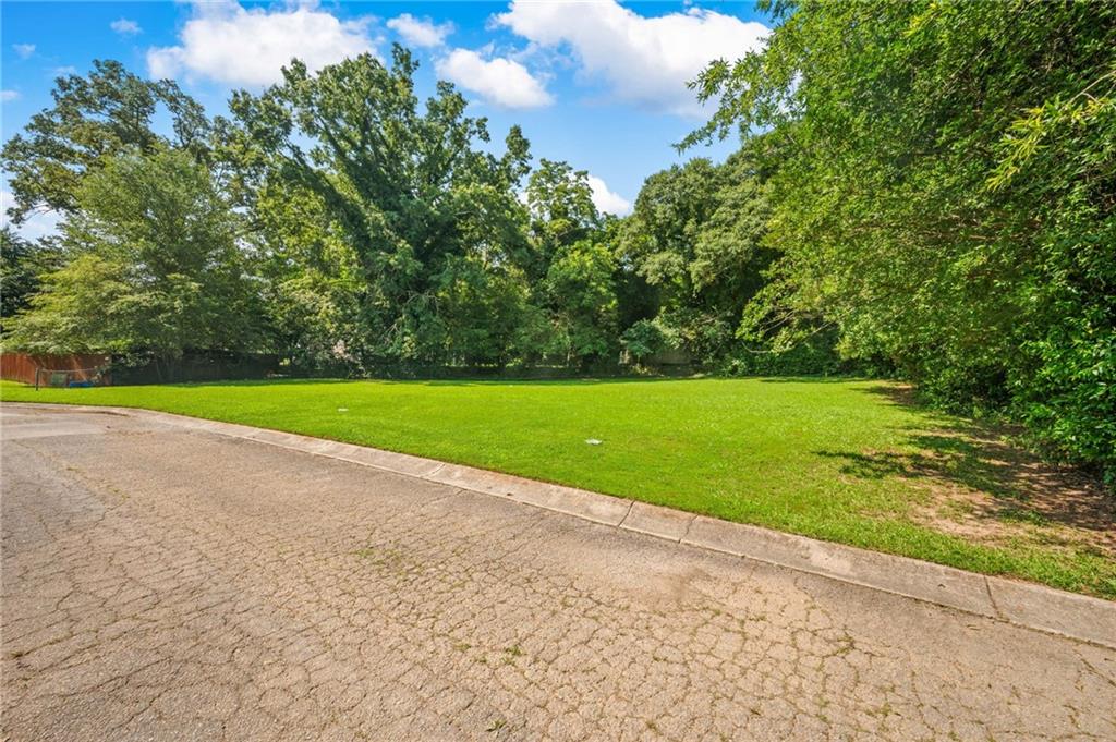 755 Dunaire Way Jonesboro, GA 30238 - Photo 2 of 7 a view of a park with large trees