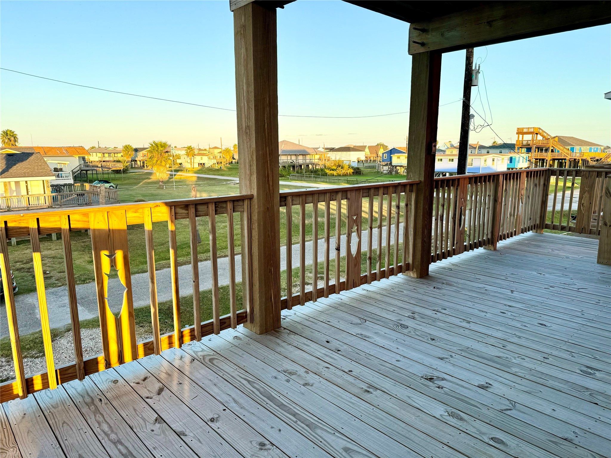 511 Caisson Street Surfside Beach, TX 77541 - Photo 23 of 33 a view of balcony with wooden floor