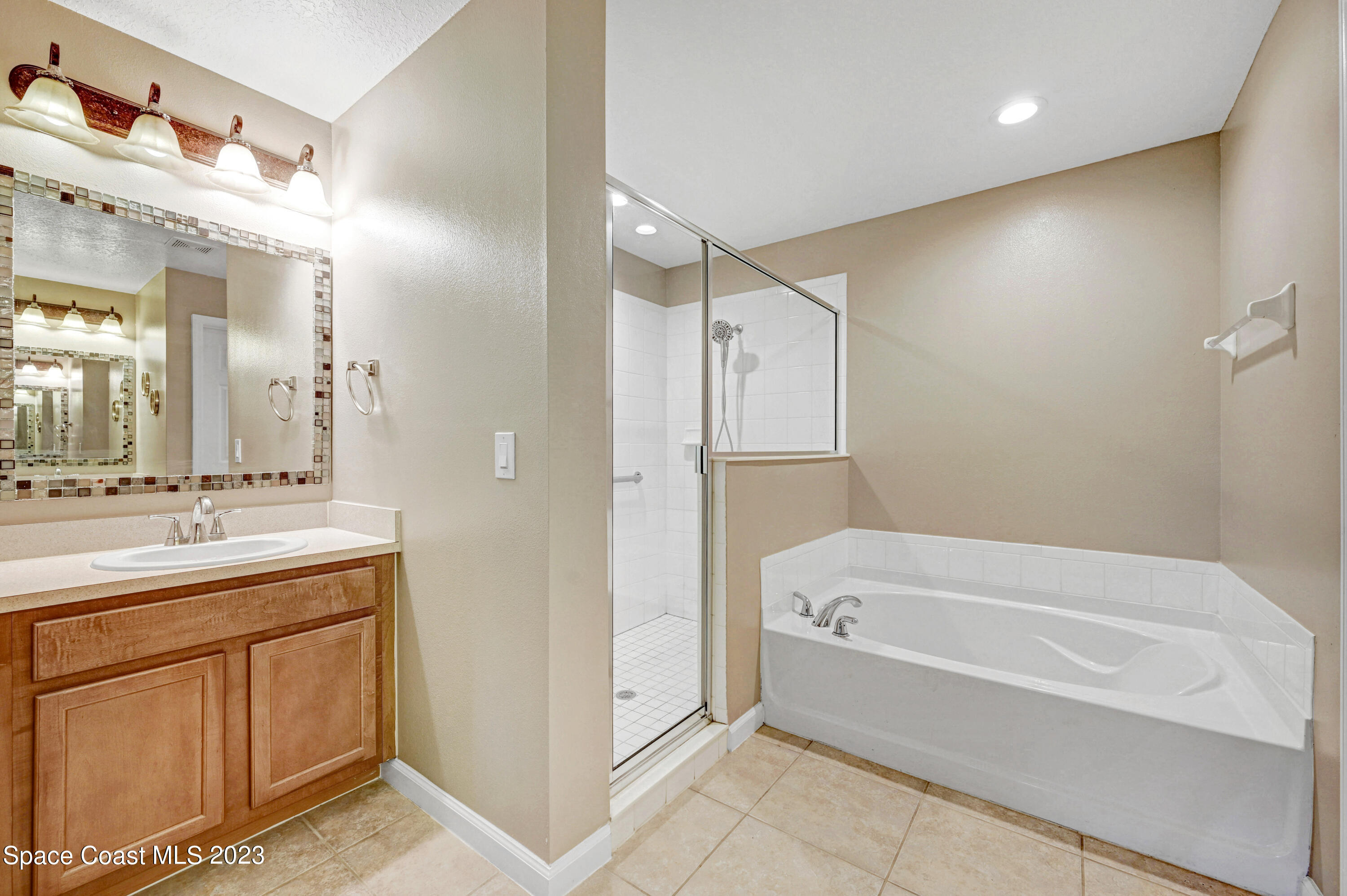 306 Abernathy Circle Palm Bay, FL 32909 - Photo 14 of 38 Separate Shower & Tub