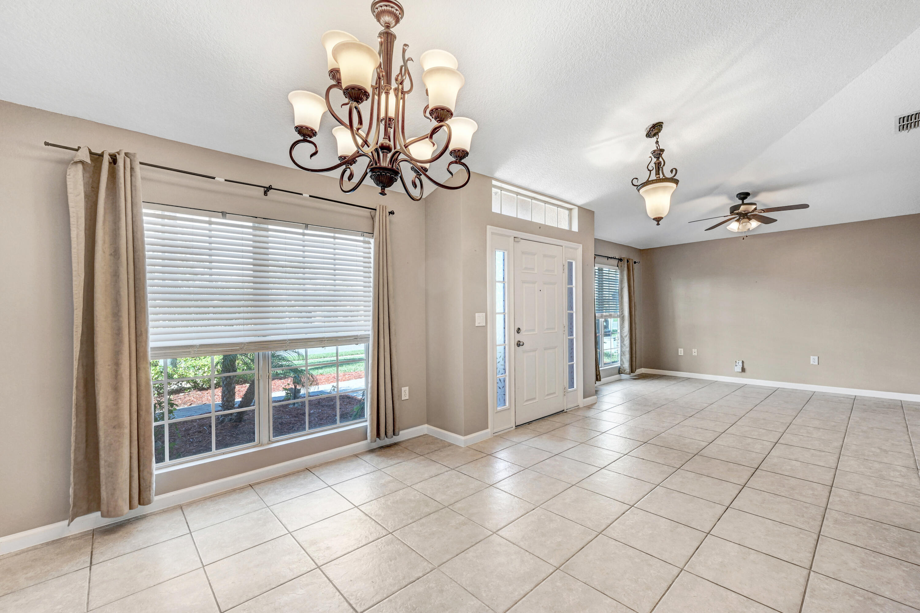 306 Abernathy Circle Palm Bay, FL 32909 - Photo 3 of 38 Formal Dining & Formal Living