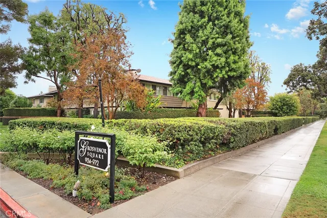 a sign board with a street sign