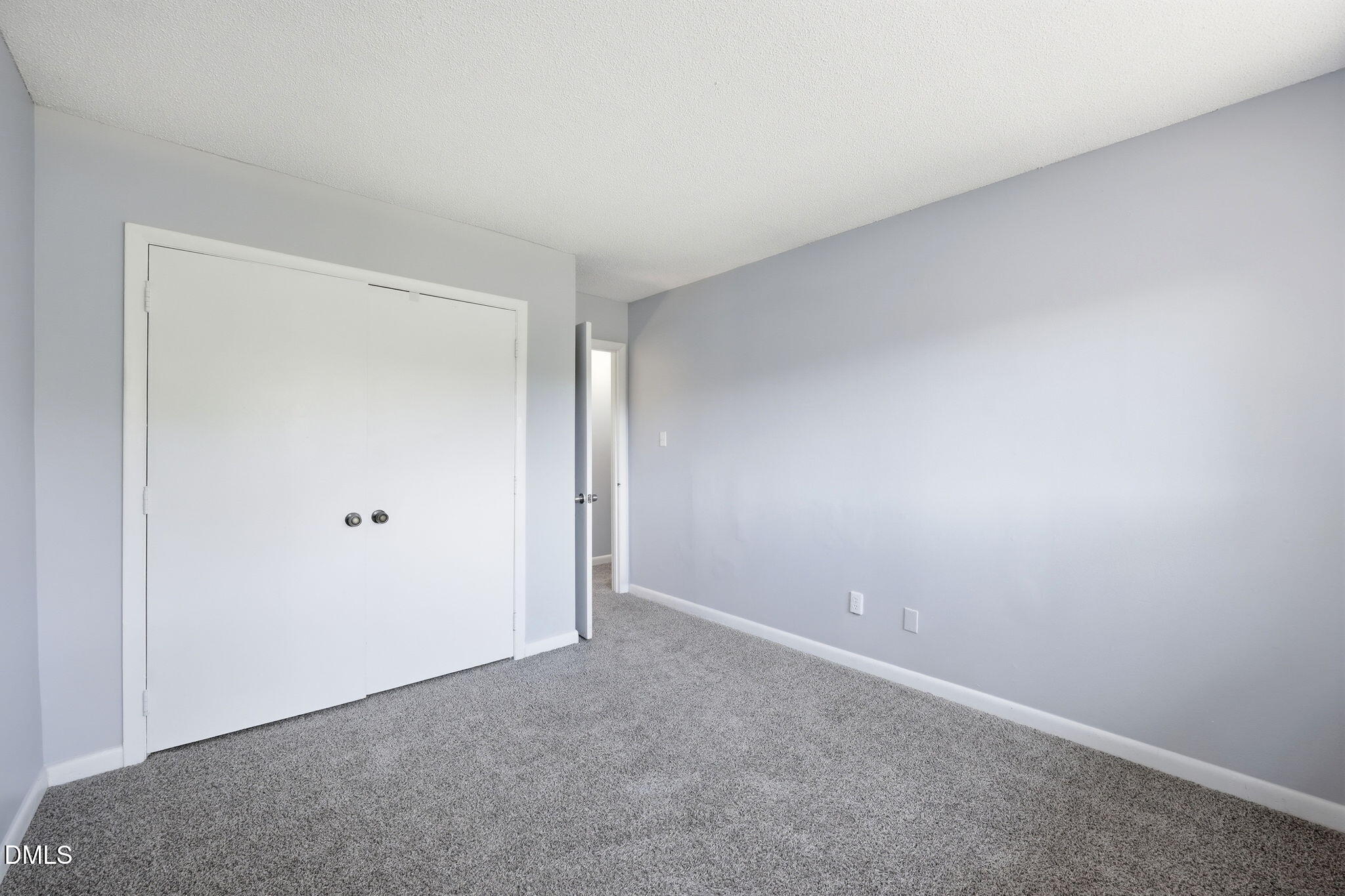 5043 Tall Pines Court Raleigh, NC 27609 - Photo 23 of 37 a view of an empty room